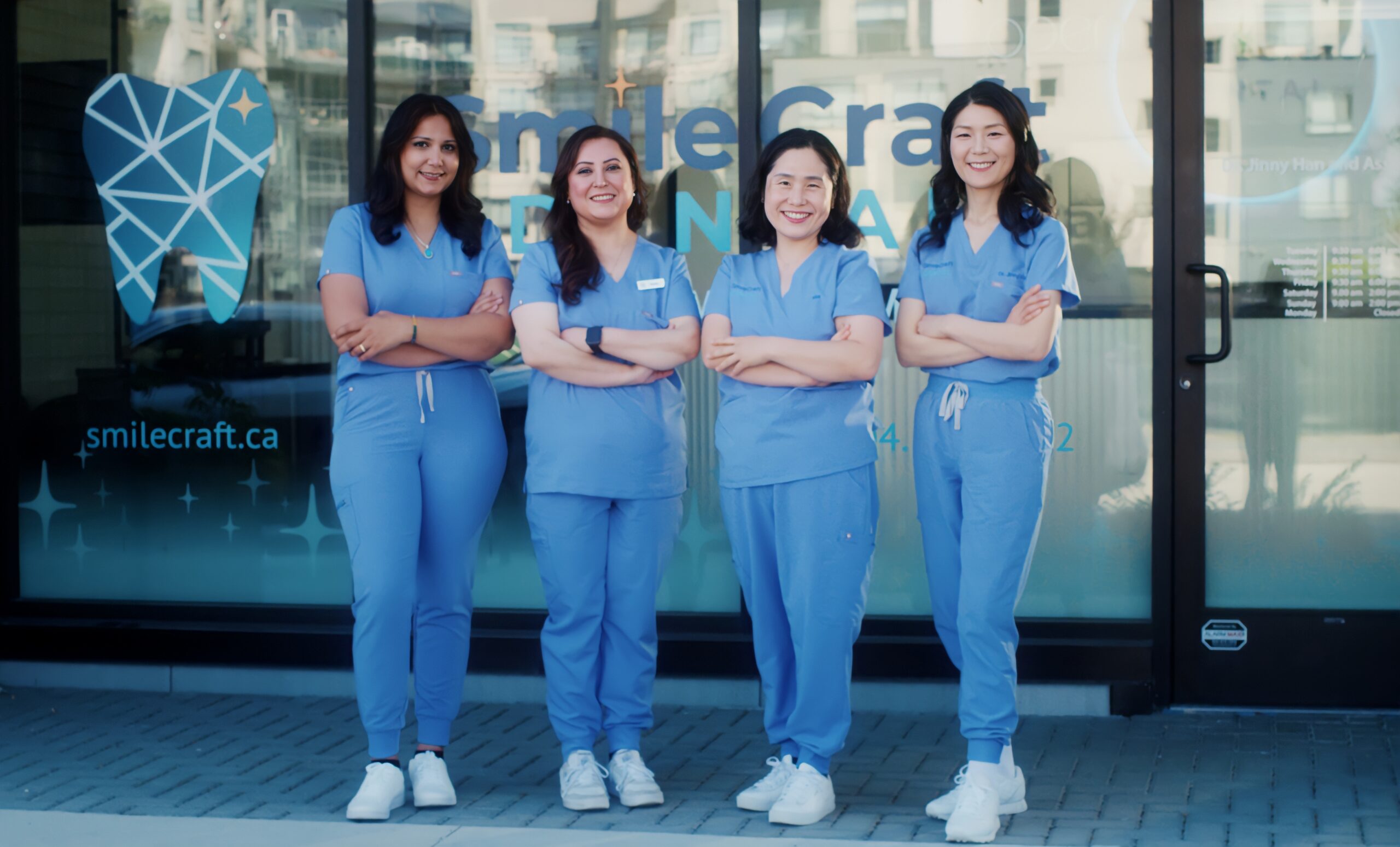 The SmileCraft Dental team with Dr. Jinny Han outside the clinic in Willoughby, Langley